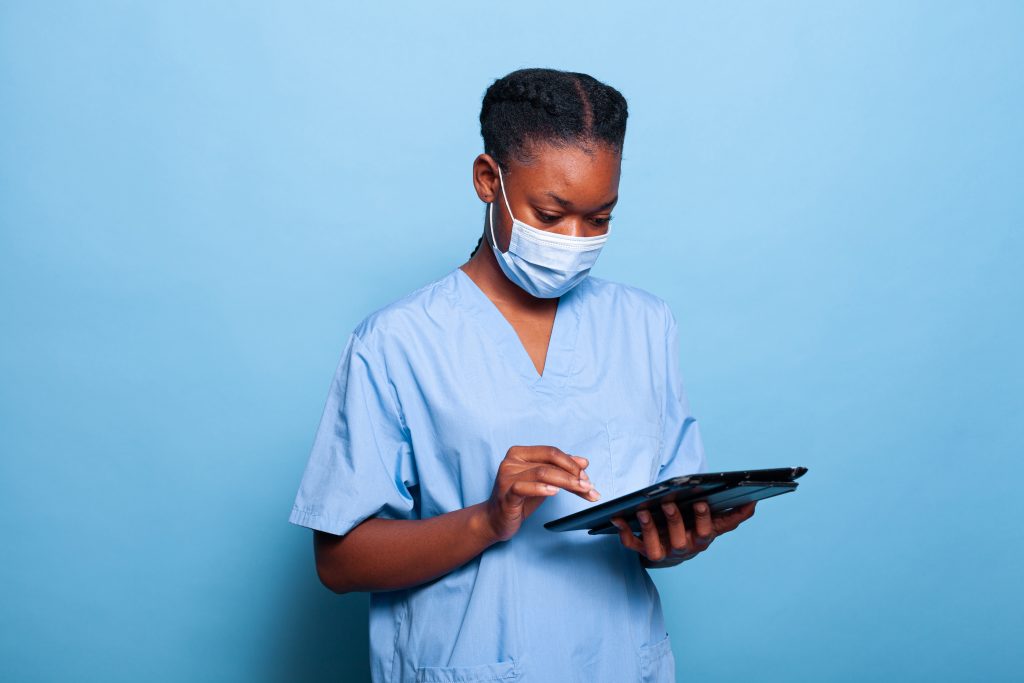 african-american-practitioner-nurse-with-medical-face-mask